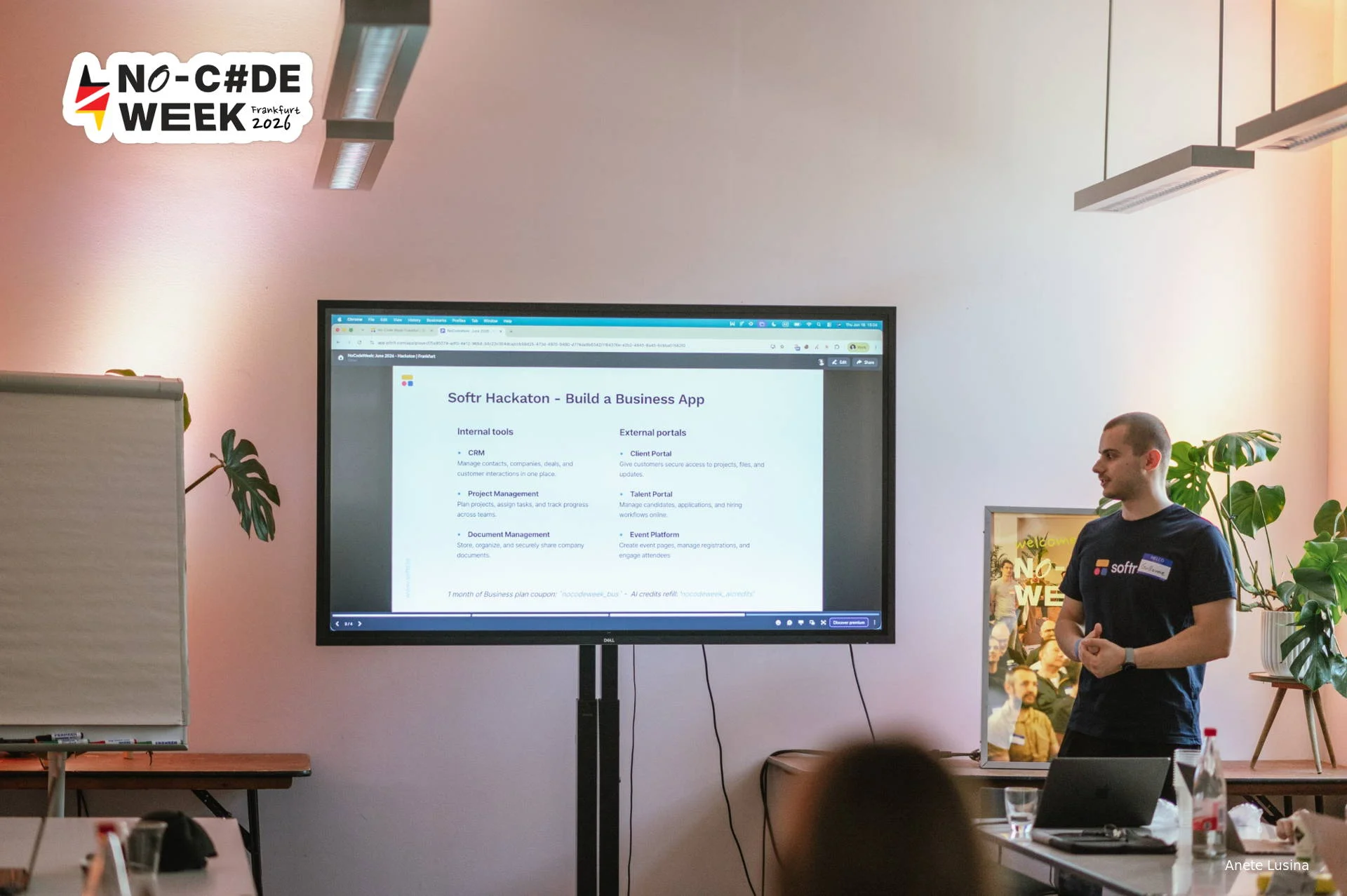 Guillaume presenting a Softr hackathon brief on a large screen at No-Code Week Frankfurt
